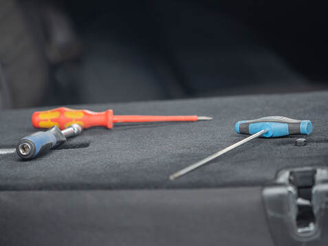 Tools for repairing dents used by Frisco Auto Hail Repair.